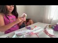 Unboxing toys with Eli and Katherine