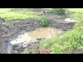 Cat 320B Excavator Trimming Soil Slope