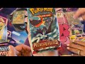 I open up Pokémon’s scarlet and violets Paldean fates and Paldea evolved ETB’s