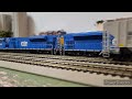 Four SD40-2's start a heavy grain train