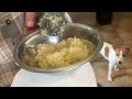 Mincing garlic with meat grinder.
