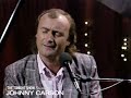 Phil Collins Sits Down With Johnny and Performs “Against All Odds” and “The Roof Is Leaking”