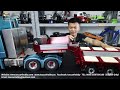 Unbox 8 axle hydraulic suspension goose neck trailer, drive loader and excavator onto it.