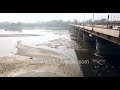 Yamuna River aerial New Delhi: NOIDATraffic crosses pollution central river across detergent flows