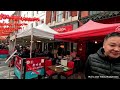 Chinatown of London walking tour. LONDON. UK. April 2024. Marc and Tikay Happiness.