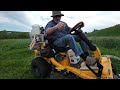 Cub Cadet ZTS1 mows tall grass.