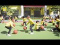 Chinese kindergarten kids synchronized basketball practice dribble routine