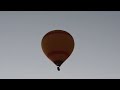 Hot air balloon firing against the early morning sky in Cappadocia.