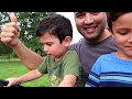 Chasing TRACTOR with kids power wheels Gator and using Riding Lawn Mower for help | Super Krew