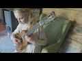 Ieva Baltmiskyte plays Light from Light by Michalis Andronikou on a-100-year old guitar