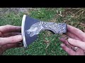 Drawing on metal. Steel wolf. Made from a rusty axe