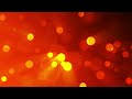 Colorful abstract neon orange bokeh particles background | 4K