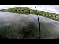 Carp fishing on big water. A huge carp has taken the bait!