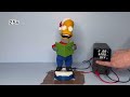 Toys Under High Voltage - Caroling Bart Simpson Gemmy Industries