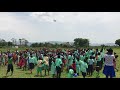 Mubende District primary school taking pictures with Wells of Life drone