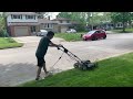 Zach using a Yardworks 20 inch 12 amp electric mower