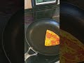 how to reheat pizza on the stove