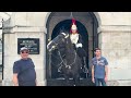 Armed Officers Confronts a Lady for Wandering into King's Guards Restricted Area