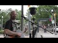 Busker Playing an Original Acoustic Rock Song in Decatur, GA
