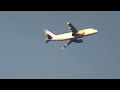 Vueling Airbus A319-100 taking off from Turin Caselle Airport to Barcelona El Prat Airport