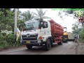 Asphalt Paver Sumitomo HA60C And Dump Truck Working