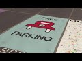 State High Seniors Paint Their Parking Spaces