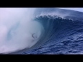 Big wave surfing set to appropriate music by Iszoloscope