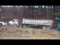 Coal truck towing back over