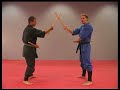 Double Stick Training Drill in the Martial Arts by Sensei Rick Tew and NinjaGym.com