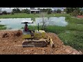 New Project Great teamwork and Operator skill Dozer Komatsu with Dump Truck Pouring soil delete pond