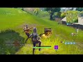 Fortnite Week 2 Treasure | Search between a Scarecrow, Pink Hotrod, and a Big Screen