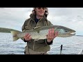 Big Brown Trout fishing from a boat on lake Þingvallavatn Iceland.