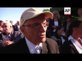 German and US D-day veterans attend service at German cemetery