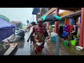 HEAVY RAINS DESTROY AFRICA TRADERS MARKET GHANA ACCRA MAKOLA