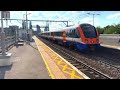 London Overground trains at Bethnal Green Station.