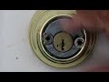 How to remove a deadbolt  with NO Visible SCREWS