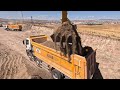 Komatsu Excavator Loading Sand Material Trucks