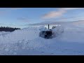 Snow clearing with old military snowblower