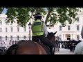 Massed Bands of HM Royal Marines marching to and from Beating Retreat. July 2024.