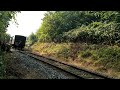 Diesel loco GDS L1 pulling vintage coaches out of Nykøbing Sj.