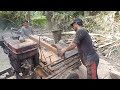 splitting wood, along with an old car