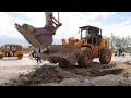 Heavy Equipment - Road roller stuck in deep mud & Recovery - រ៉ូឡូជាប់ផុងជ្រៅ និងទាញចេញ