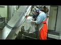 Freezing trawler fishing and  processing fish fillets.