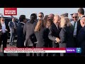 President Joe Biden greets city leaders after arriving in Houston