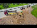 Powerful Komatsu D58E1 Bulldozer Push Soil , Clearing Land Fill up and  Dump Truck Unloading Soil