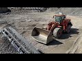 4K stone crusher action with jonsson jaw crusher and screen.keestrack stacker. Volvo 530++